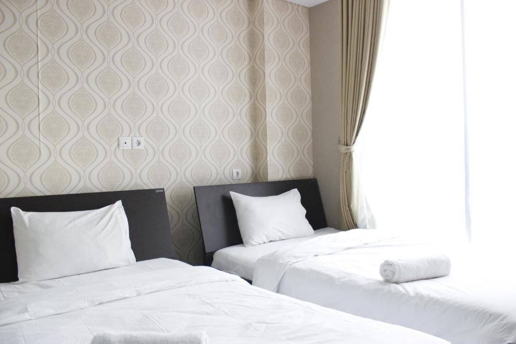 Stylish 1BR near ITB University at Dago Suites Apartment By Travelio - One-Bedroom Apartment