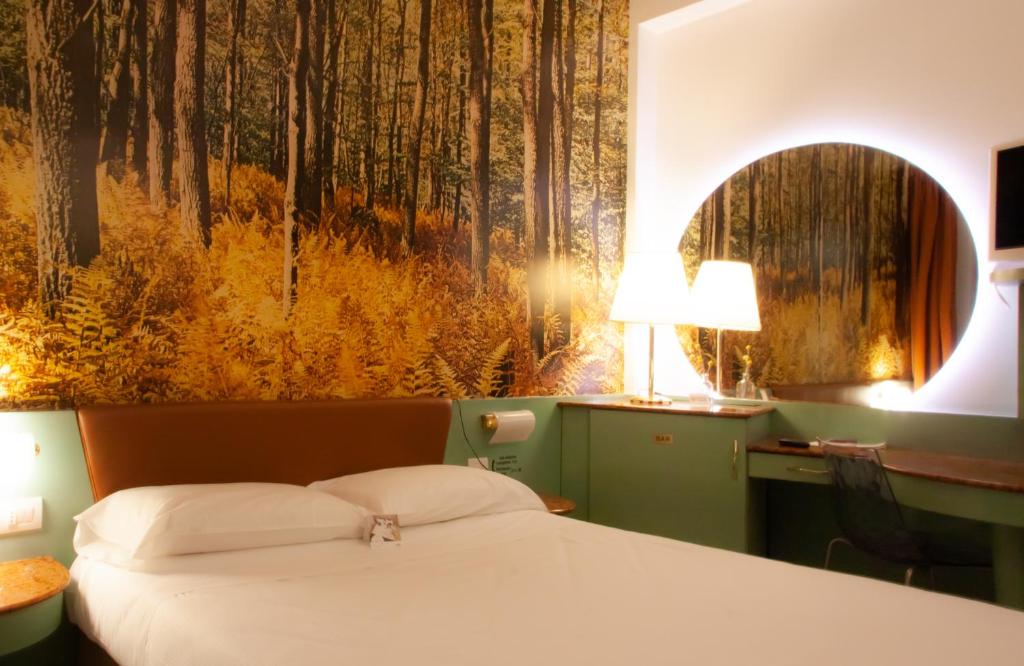 Postel nebo postele na pokoji v ubytování Hotel Motel 2000