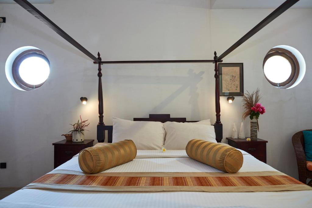 Postel nebo postele na pokoji v ubytování Villa Sunbird Negombo