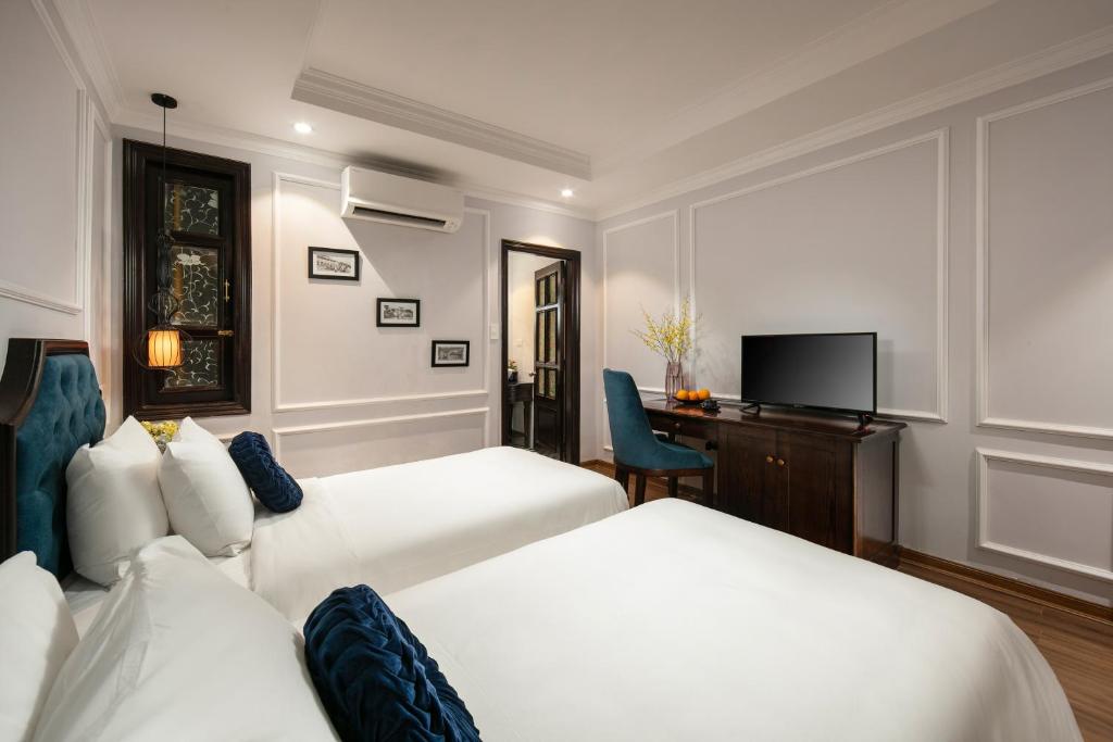 Postel nebo postele na pokoji v ubytování Maya Boutique Hotel & Spa