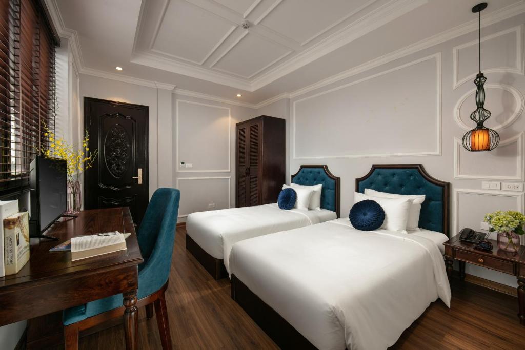 Postel nebo postele na pokoji v ubytování Maya Boutique Hotel & Spa