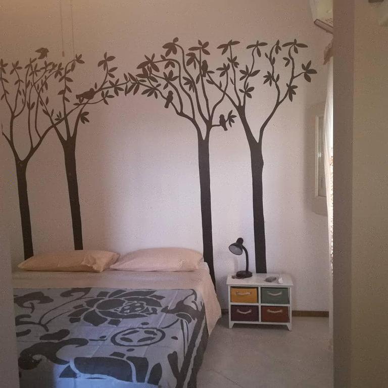 Łóżko lub łóżka w pokoju w obiekcie Le Vallonee B&B