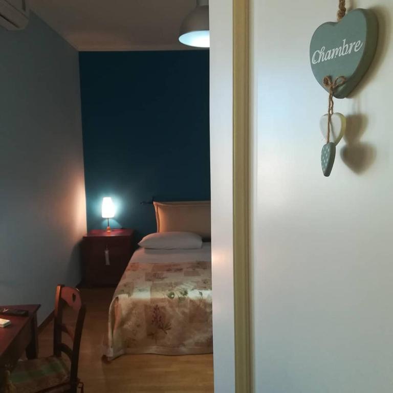 Łóżko lub łóżka w pokoju w obiekcie Le Vallonee B&B