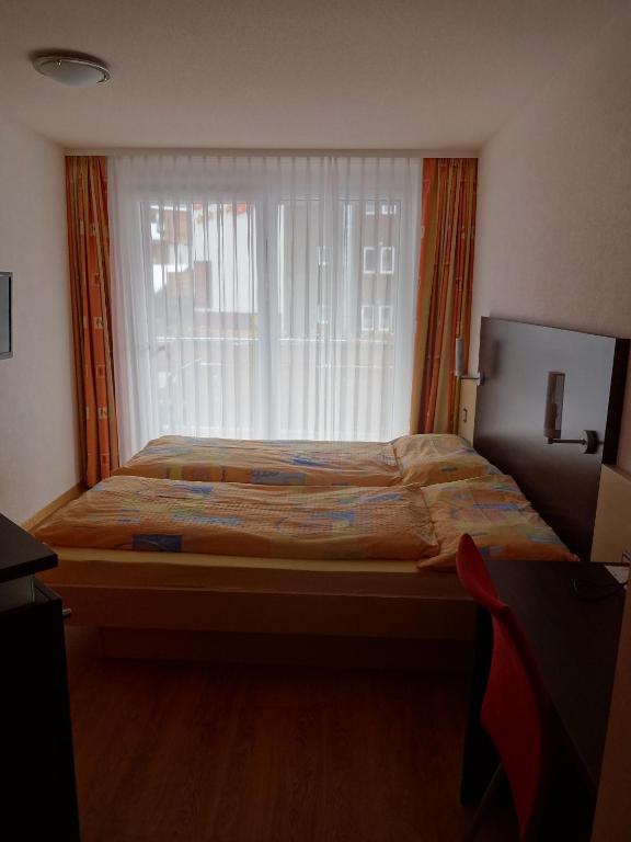 Postel nebo postele na pokoji v ubytování Appartements Feehof