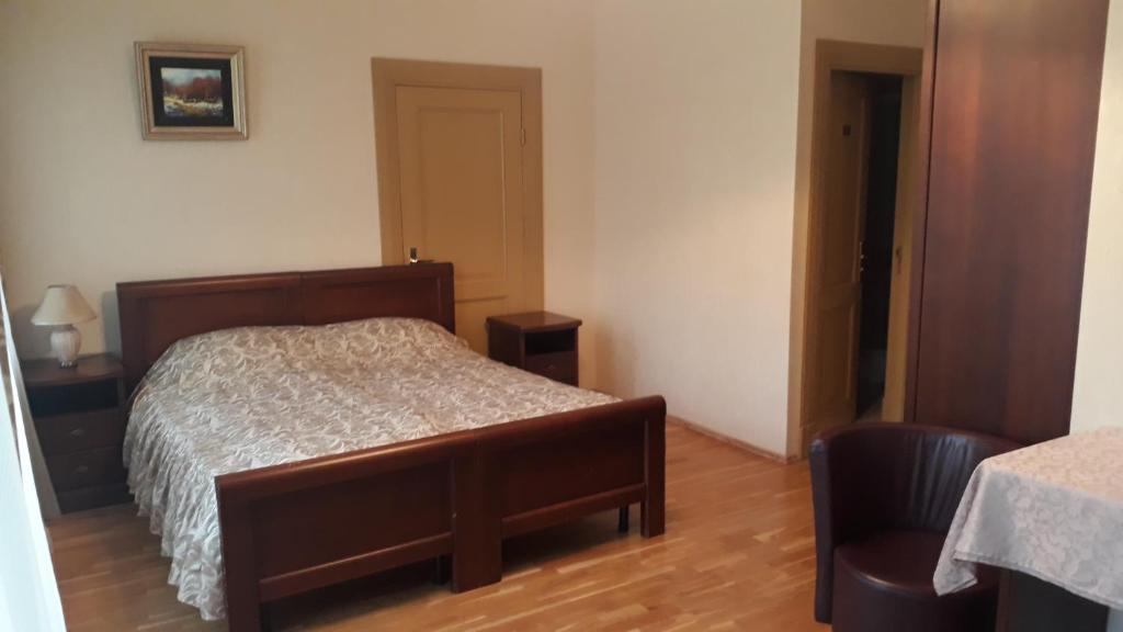 Postel nebo postele na pokoji v ubytování Sventes Muiža