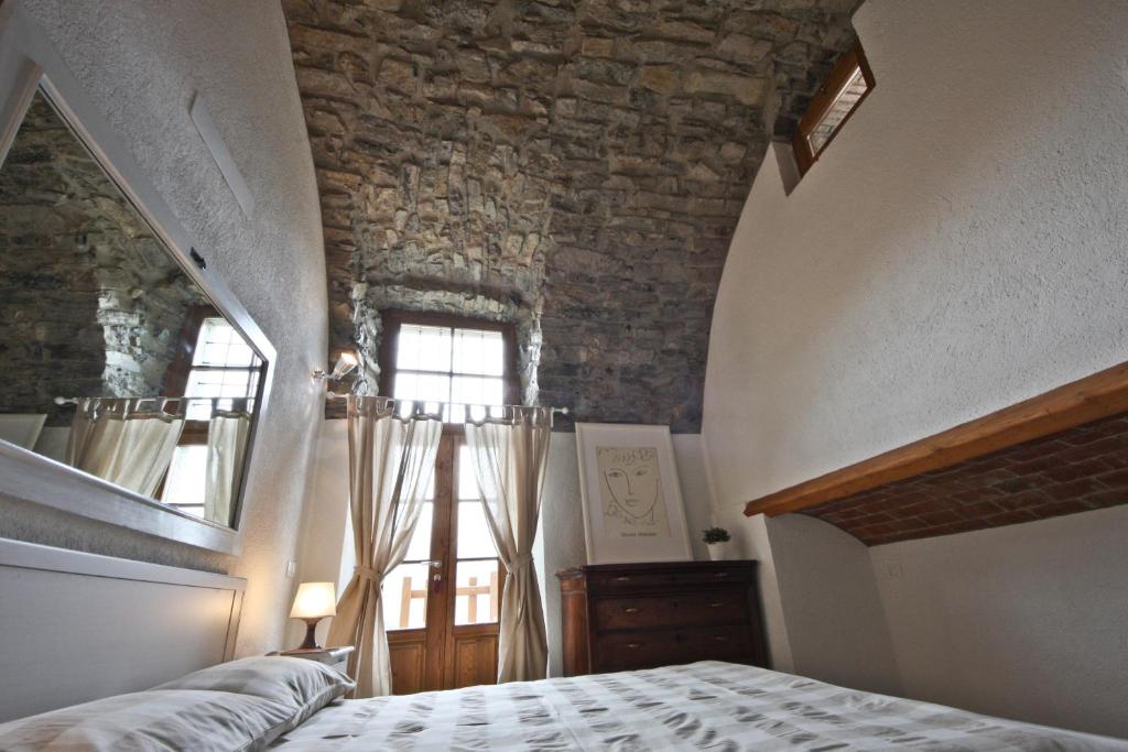Letto o letti in una camera di Agriturismo Crotto Di Somana