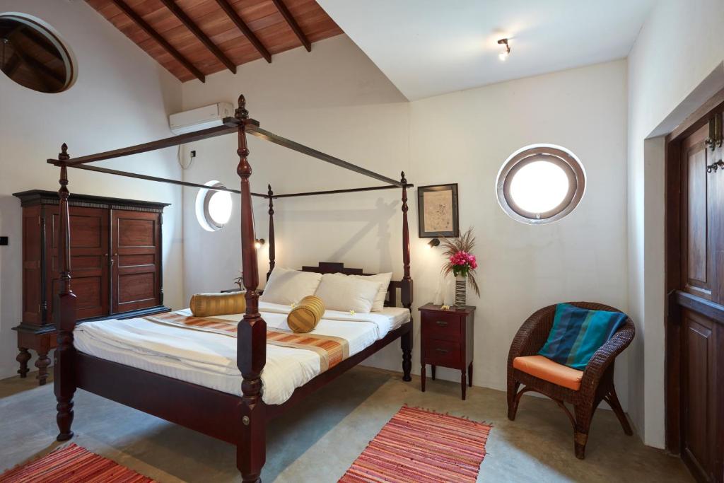 Postel nebo postele na pokoji v ubytování Villa Sunbird Negombo