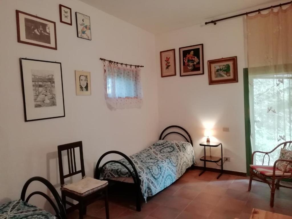 Postel nebo postele na pokoji v ubytování Podere Poggio Corbo