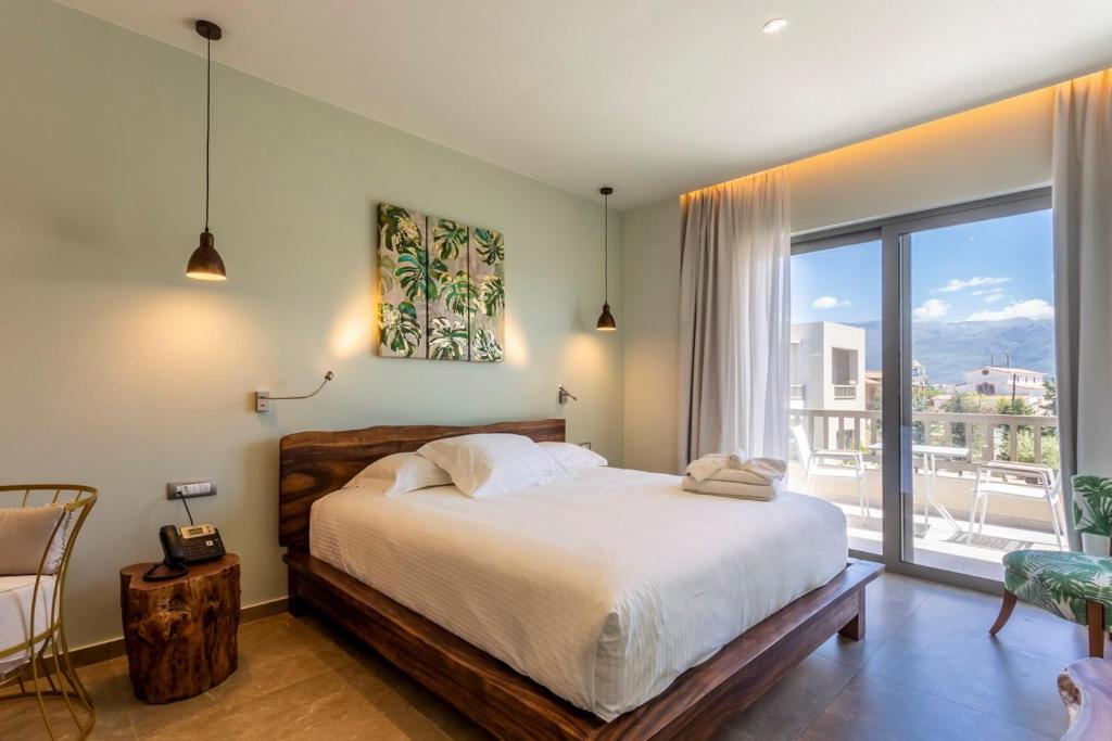 Katil atau katil-katil dalam bilik di Elysian Luxury Hotel and Spa