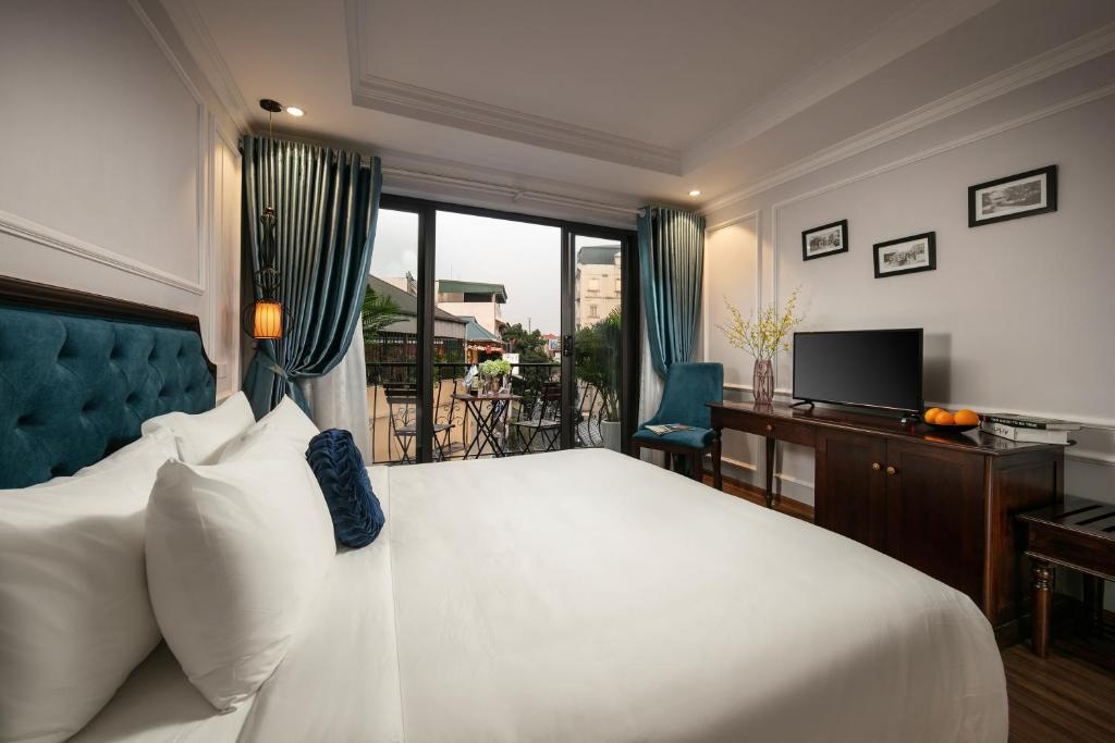 Postel nebo postele na pokoji v ubytování Maya Boutique Hotel & Spa