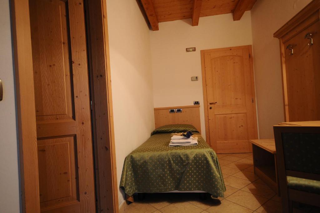 Postel nebo postele na pokoji v ubytování Agritur Campo Fiorito