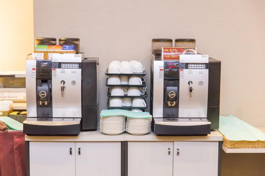Kuchyň nebo kuchyňský kout v ubytování Hotel IL Cuore Namba