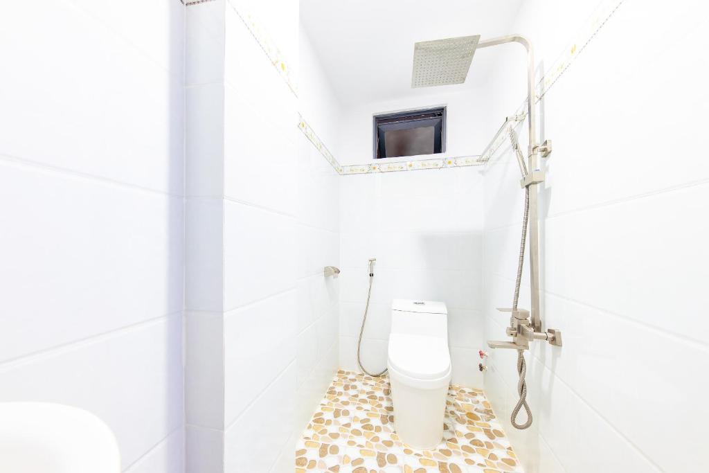 Koupelna v ubytování Q3 Viet An Hotel Nha Trang