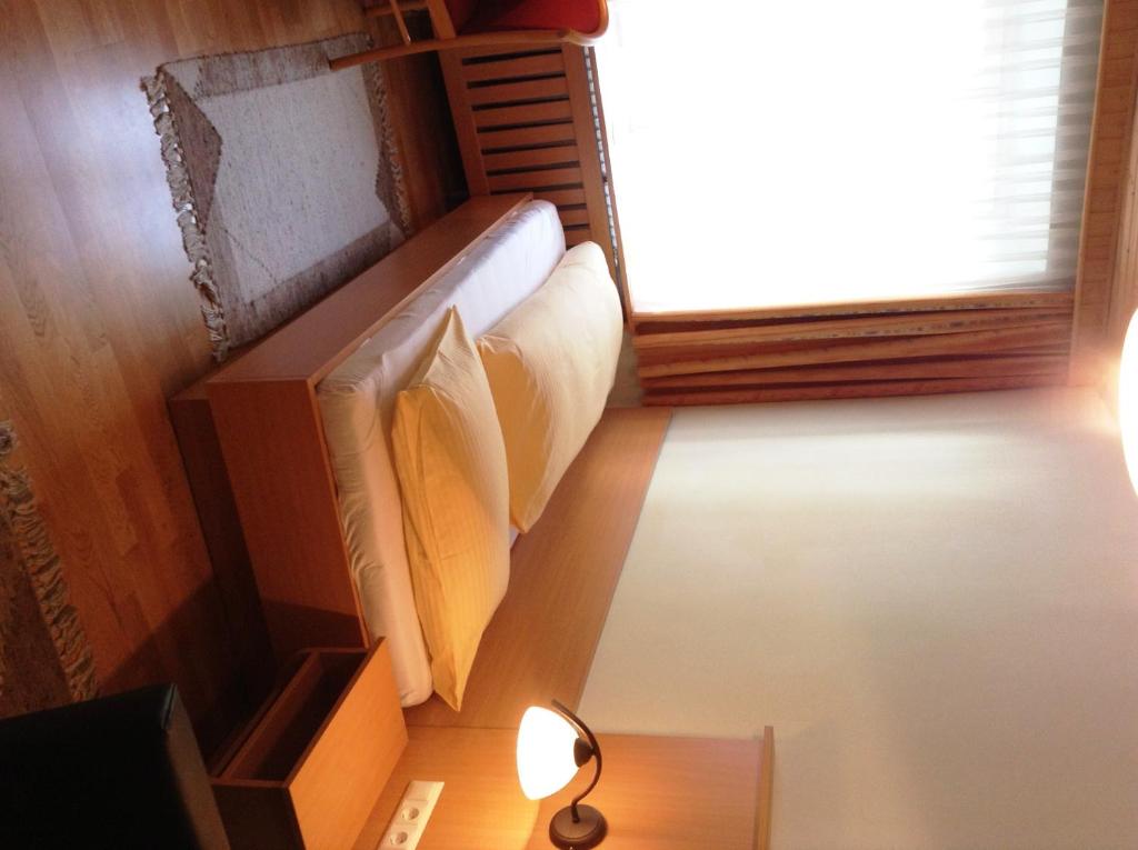 Postel nebo postele na pokoji v ubytování Gasthof Post
