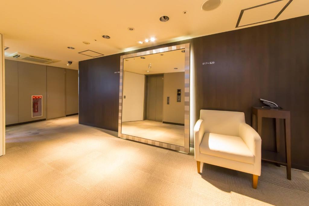 Postel nebo postele na pokoji v ubytování Hotel IL Cuore Namba