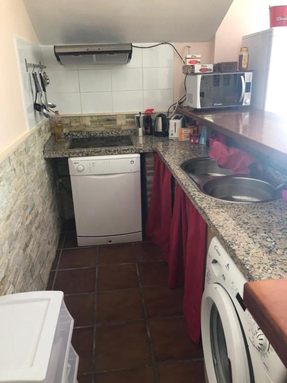 Kuchyň nebo kuchyňský kout v ubytování Ideal loft Malaga