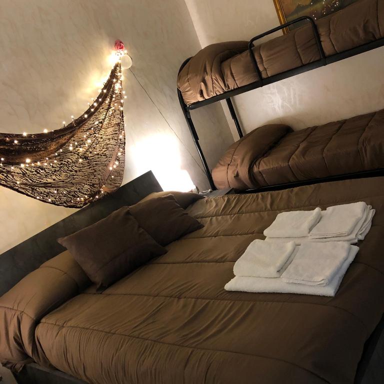 Postel nebo postele na pokoji v ubytování B&B Planet
