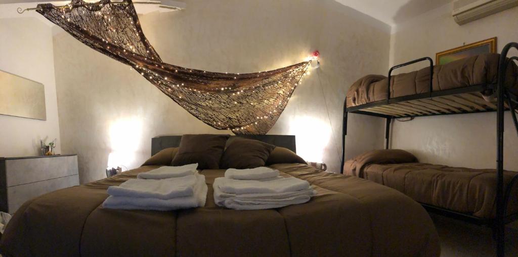 Postel nebo postele na pokoji v ubytování B&B Planet