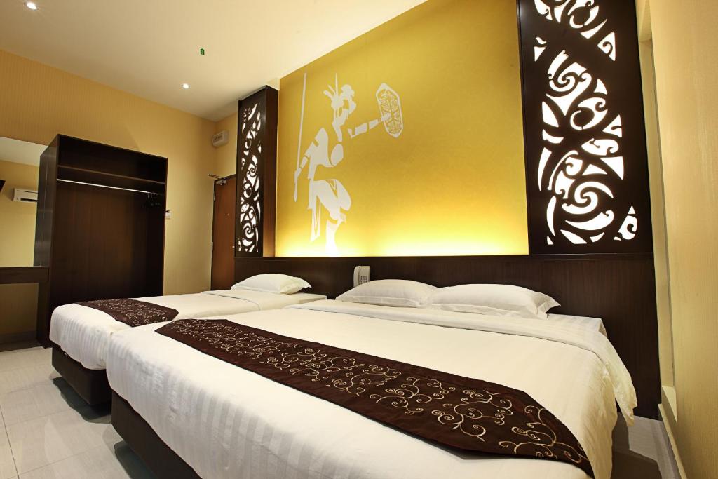 Postel nebo postele na pokoji v ubytování Sri Enstek Hotel KLIA, KLIA 2 & F1