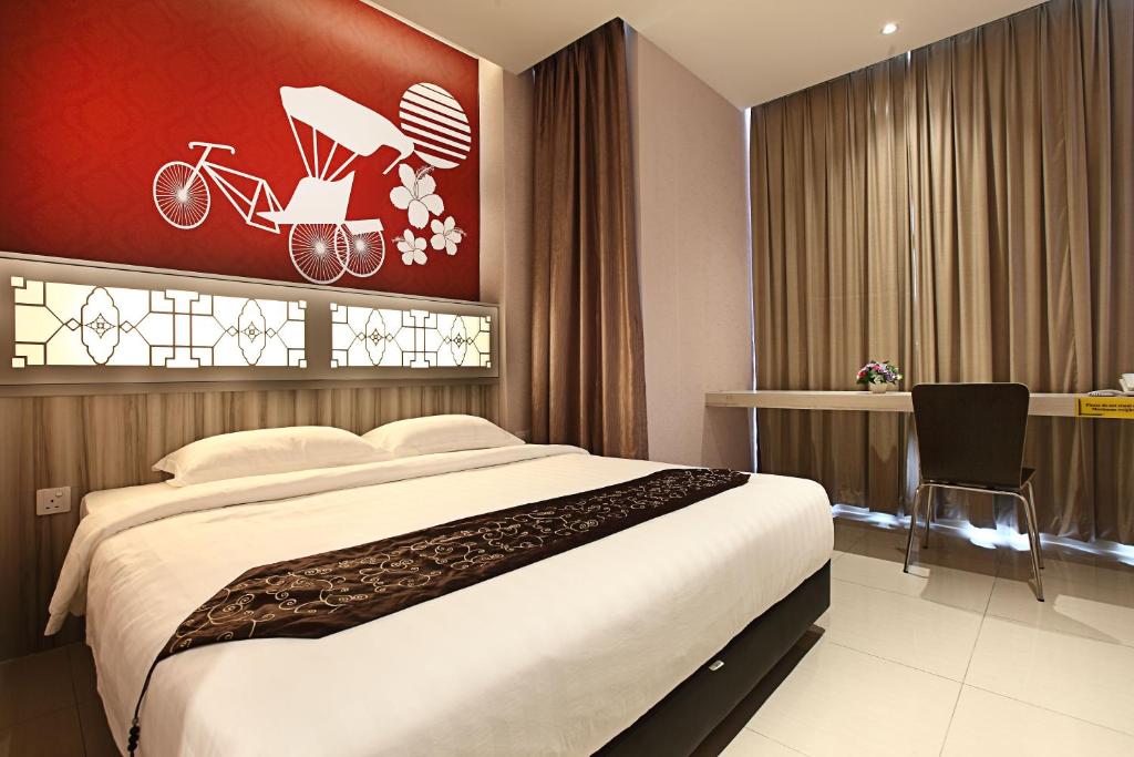 Postel nebo postele na pokoji v ubytování Sri Enstek Hotel KLIA, KLIA 2 & F1