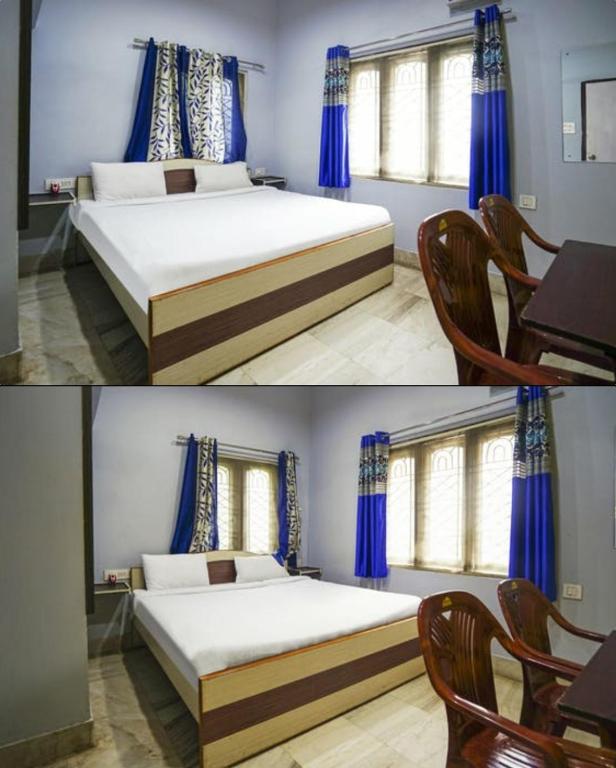 Postel nebo postele na pokoji v ubytování Ratna Resort near Bhubaneswar Airport