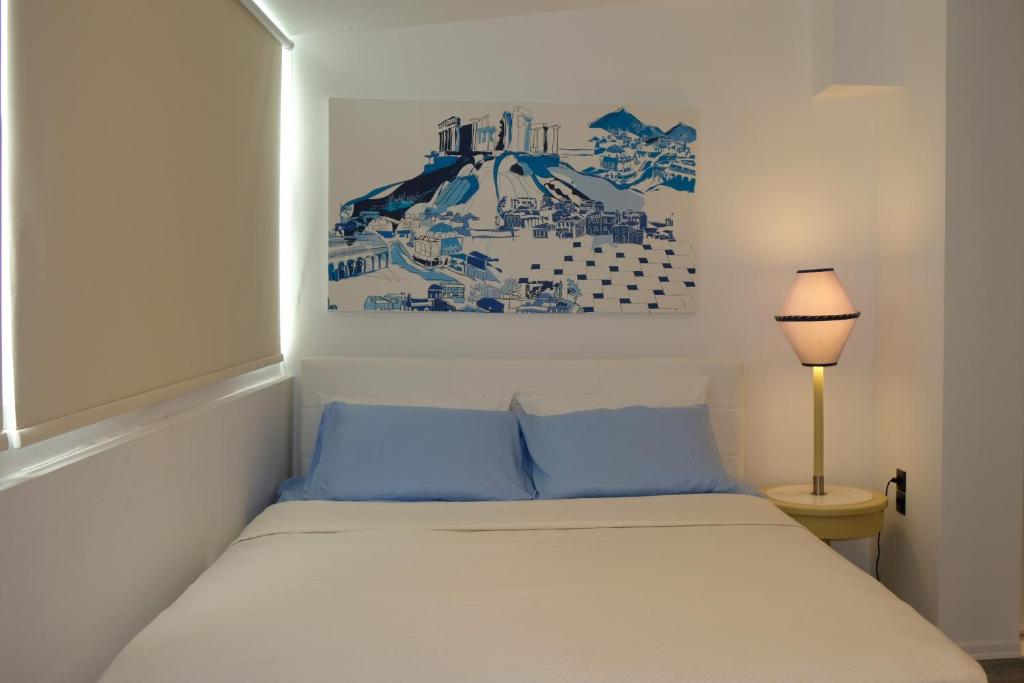 A bed or beds in a room at STUDIO ANASTASIA