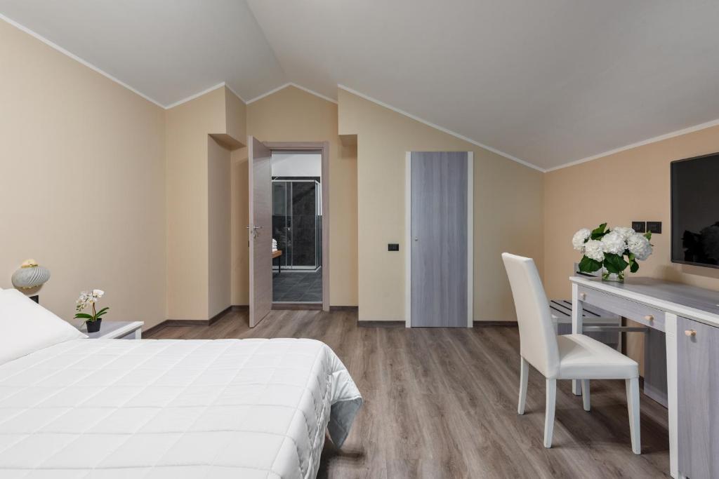 TV a/nebo společenská místnost v ubytování Rivoli Hotel