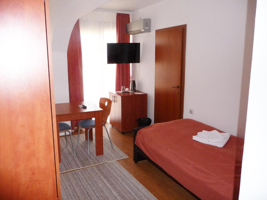 Postel nebo postele na pokoji v ubytování Sobe Rooms Aleksandar