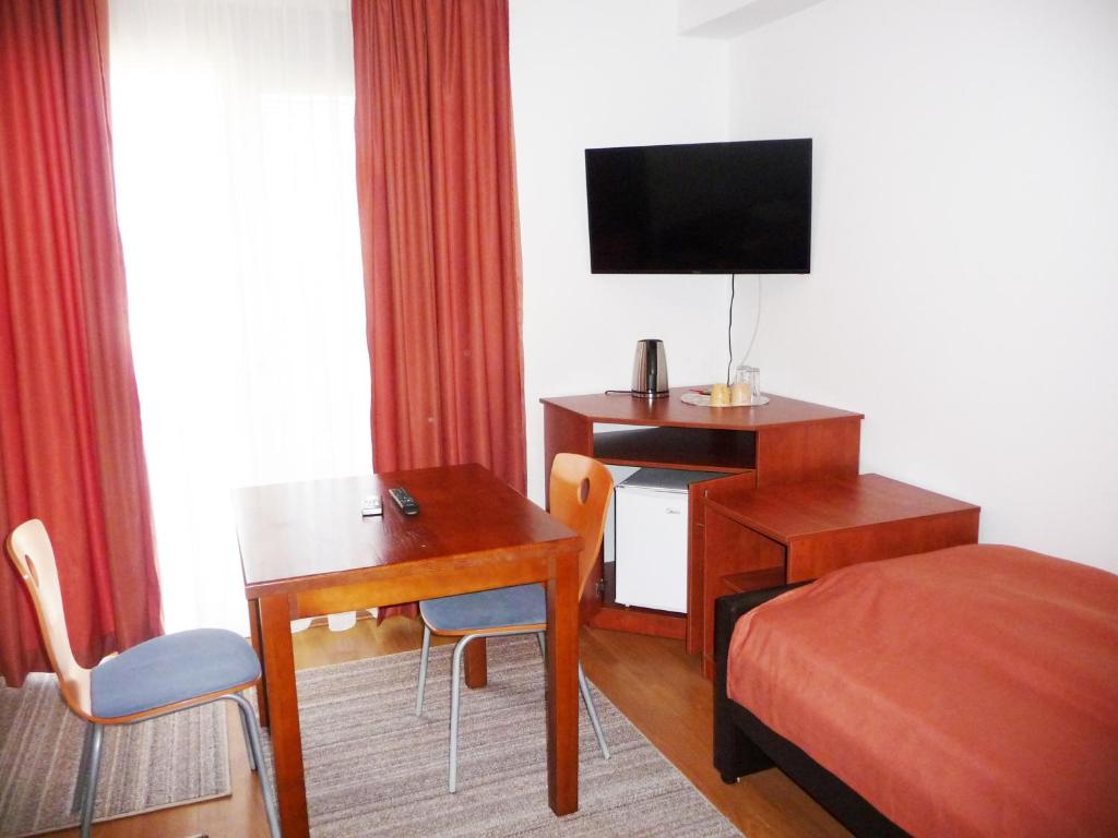 TV a/nebo společenská místnost v ubytování Sobe Rooms Aleksandar