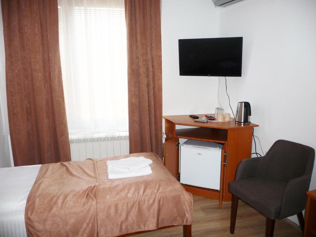 TV a/nebo společenská místnost v ubytování Sobe Rooms Aleksandar