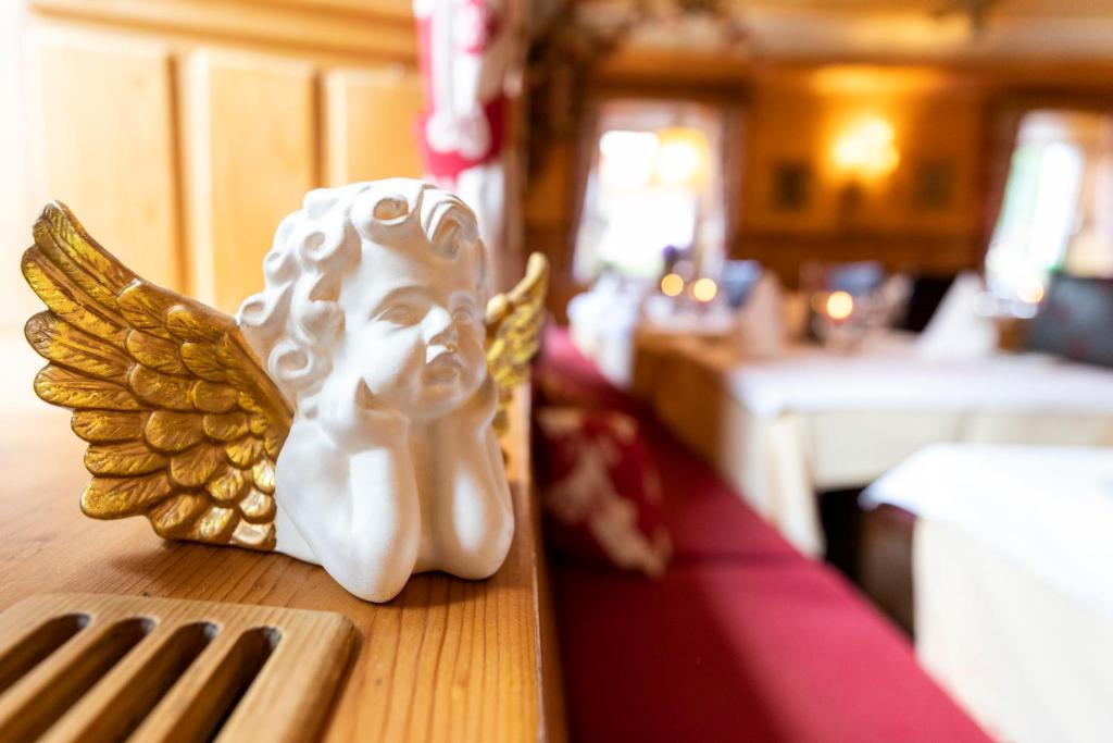 Postel nebo postele na pokoji v ubytování Hotel & Restaurant Wastlwirt