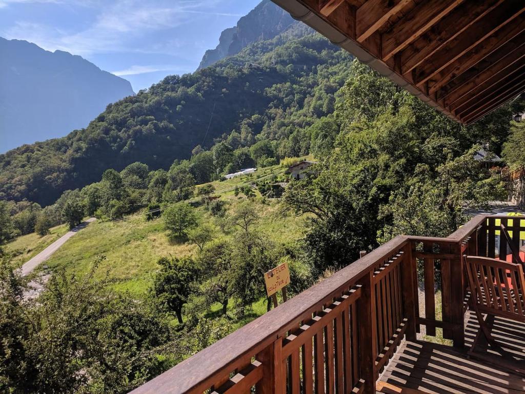 a balcony with a view of a mountain at Les Cristallieres Venosc in Vénosc