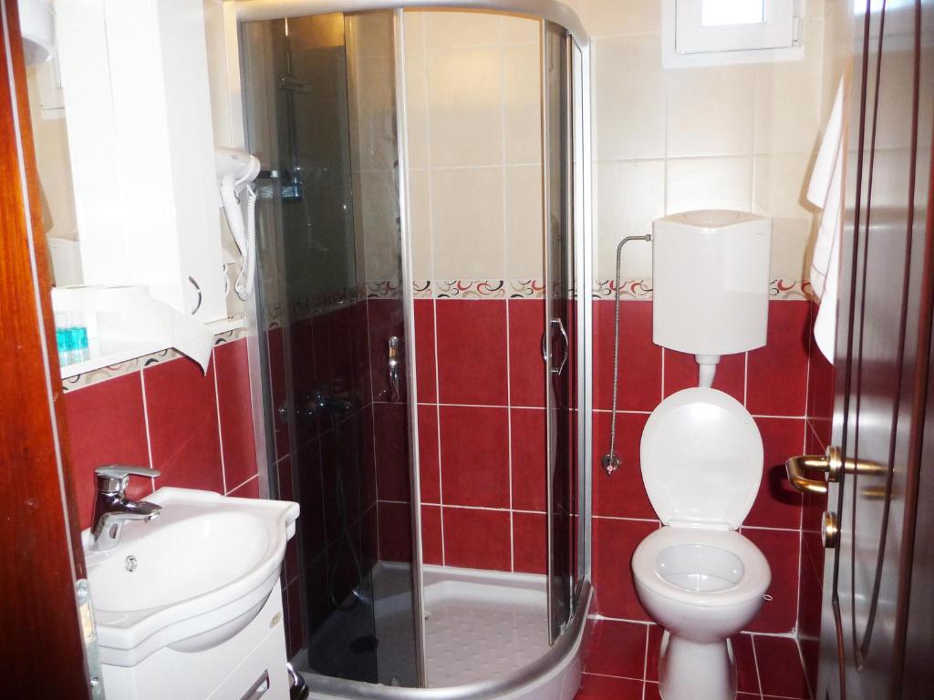Koupelna v ubytování Sobe Rooms Aleksandar