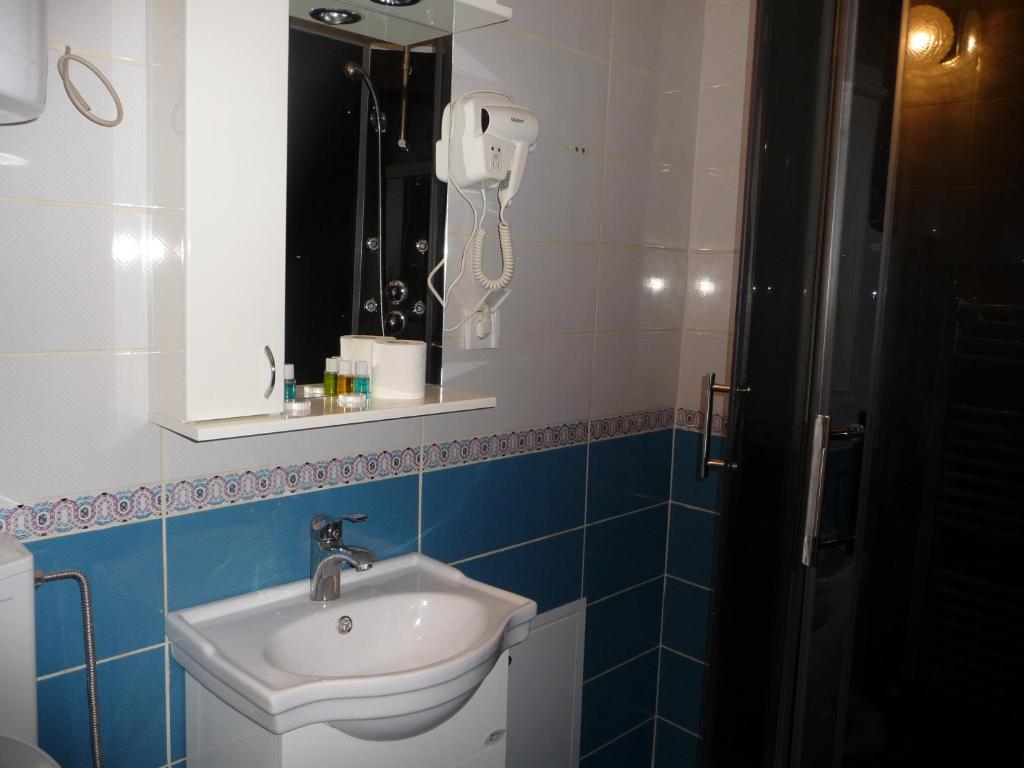 Koupelna v ubytování Sobe Rooms Aleksandar
