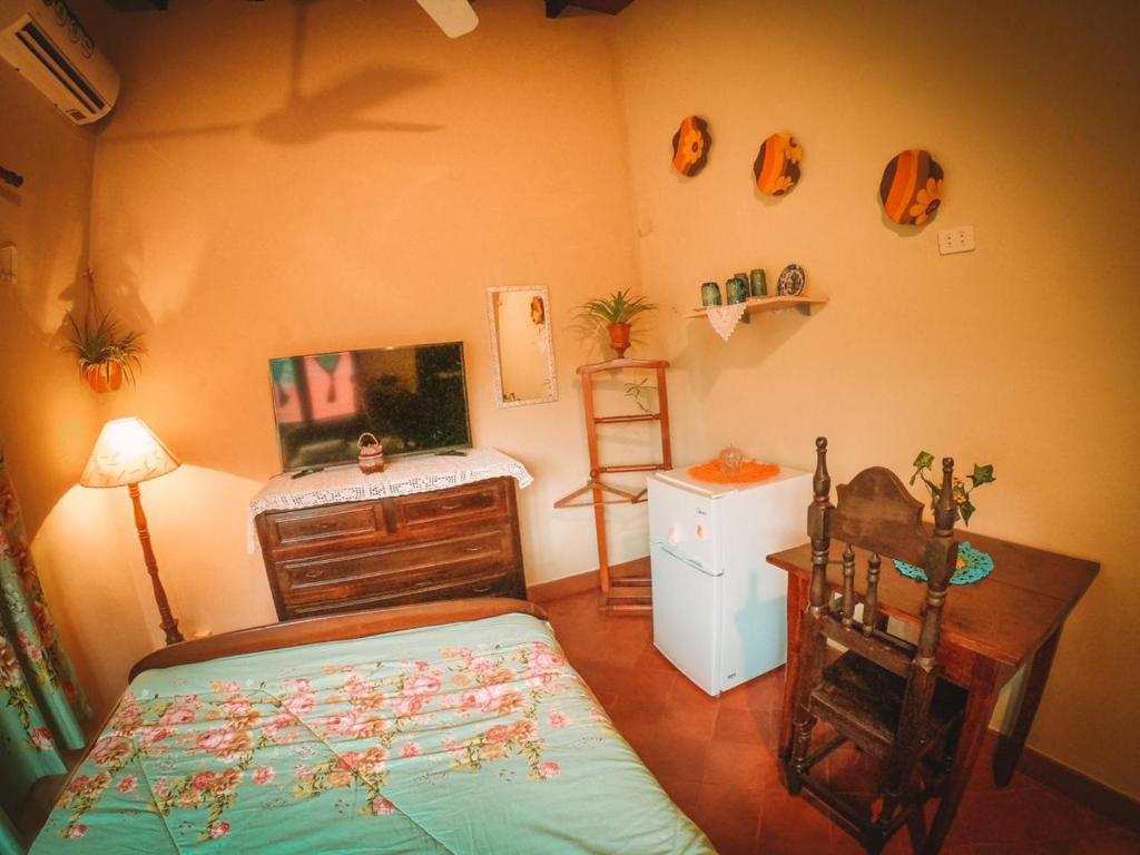 Postel nebo postele na pokoji v ubytování Hostal Mi lugar Vintage