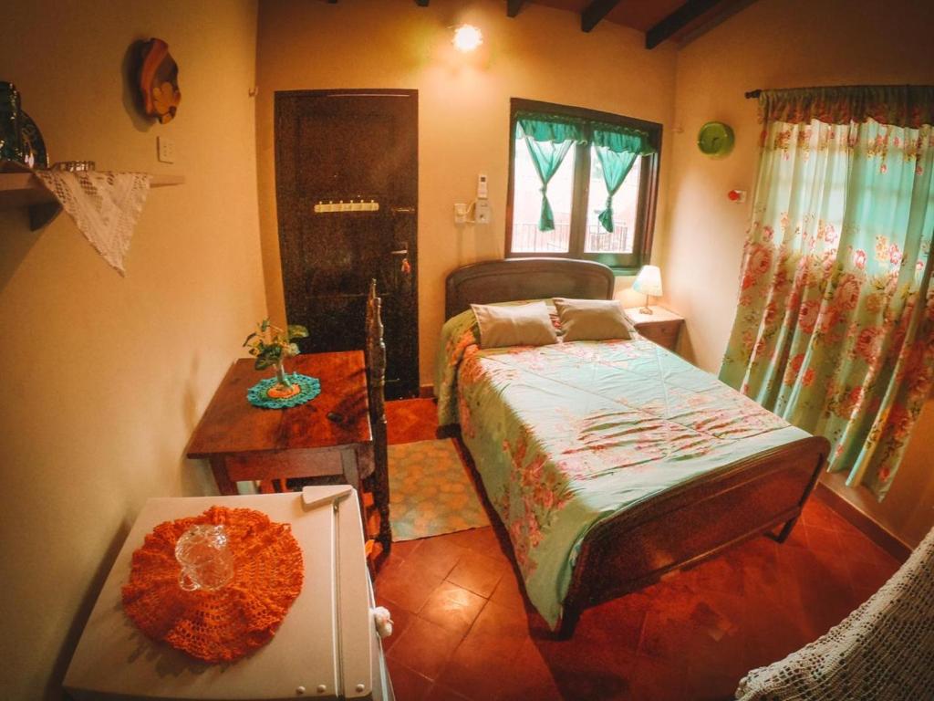 Postel nebo postele na pokoji v ubytování Hostal Mi lugar Vintage