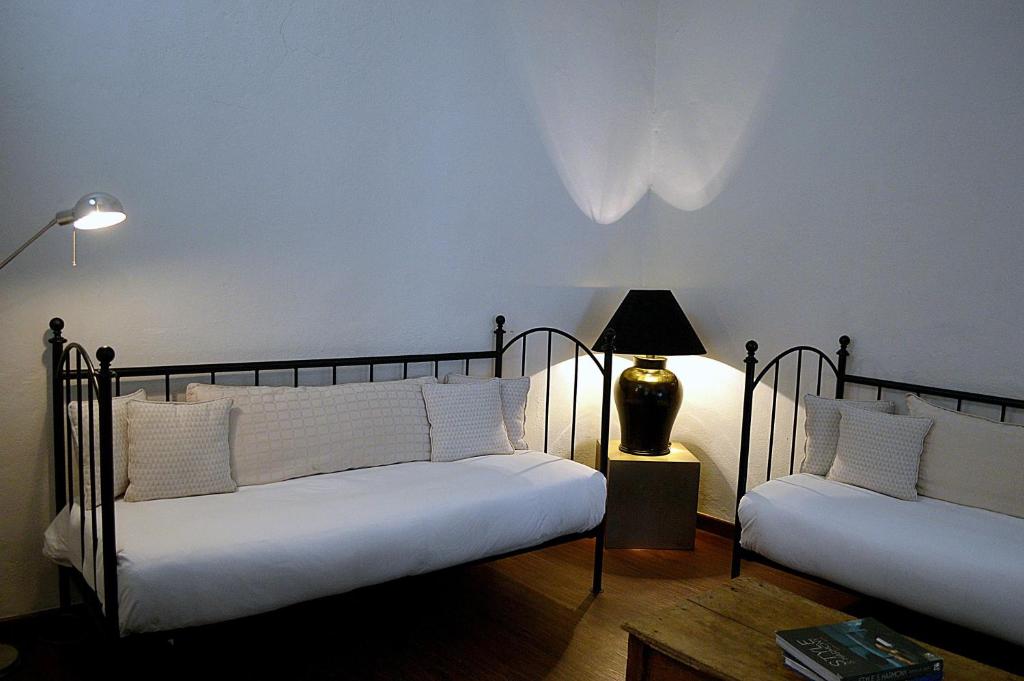 Postel nebo postele na pokoji v ubytování Casa de Los Olivos
