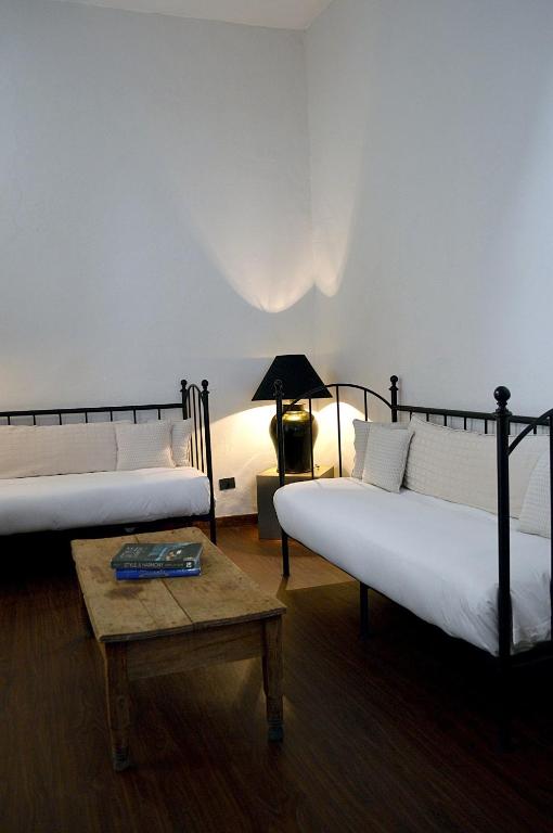 Postel nebo postele na pokoji v ubytování Casa de Los Olivos