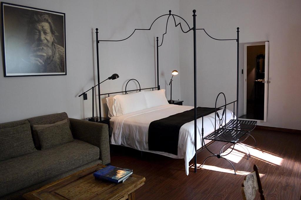 Postel nebo postele na pokoji v ubytování Casa de Los Olivos