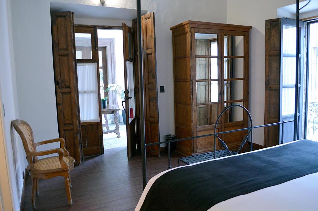 Postel nebo postele na pokoji v ubytování Casa de Los Olivos