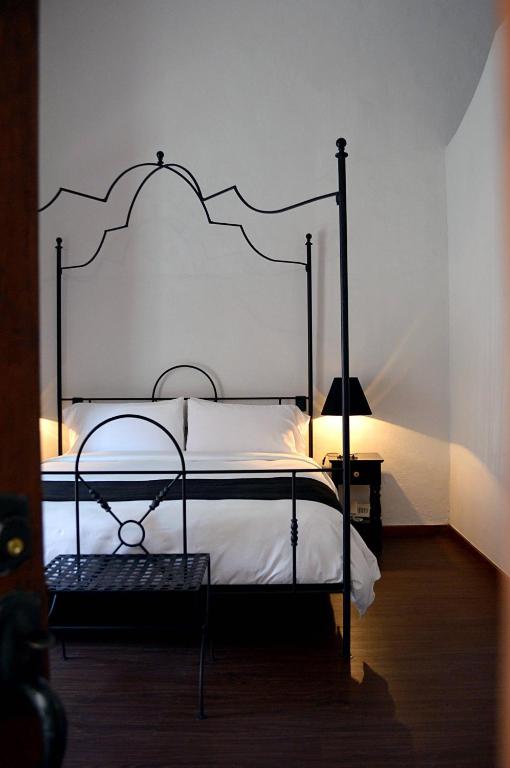 Postel nebo postele na pokoji v ubytování Casa de Los Olivos