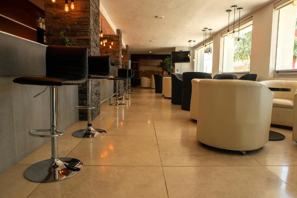 TV a/nebo společenská místnost v ubytování Hotel St. George