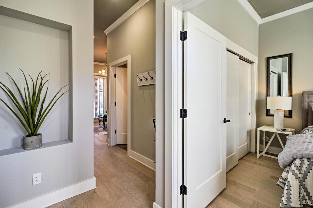 a hallway with a door leading to a living room at Downtown Modern Luxury - Great location in Chattanooga