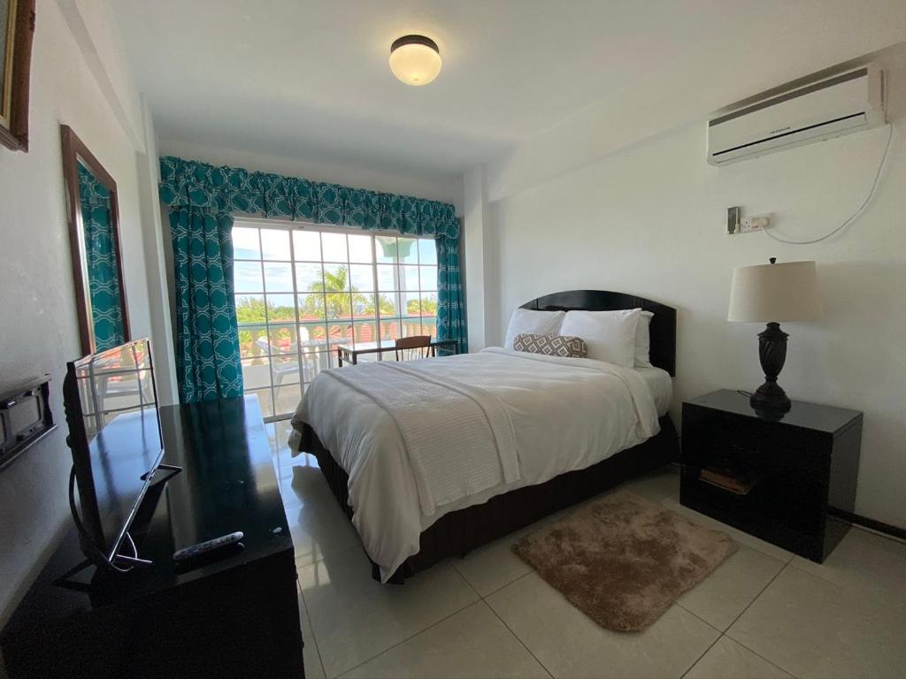 Una cama o camas en una habitación de Match Resort