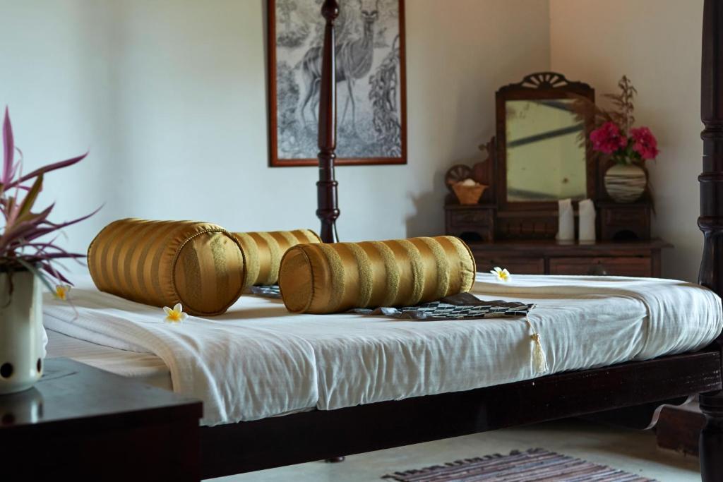 Postel nebo postele na pokoji v ubytování Villa Sunbird Negombo