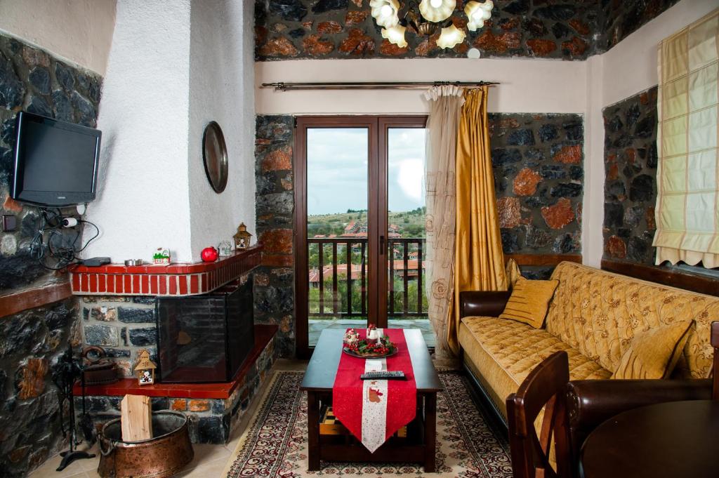 Televízia a/alebo spoločenská miestnosť v ubytovaní Eva Guesthouse