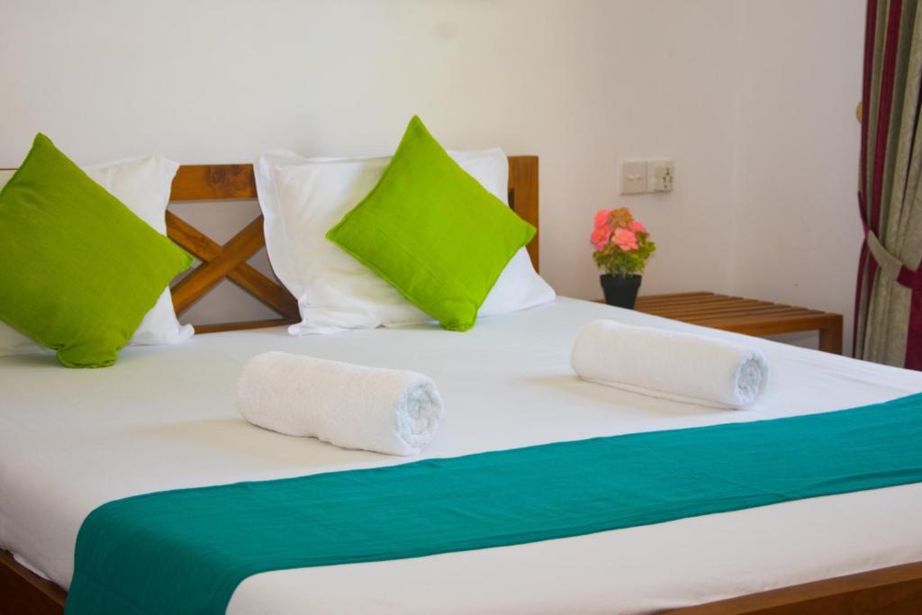 Postel nebo postele na pokoji v ubytování Di Sicuro Tourist Inn