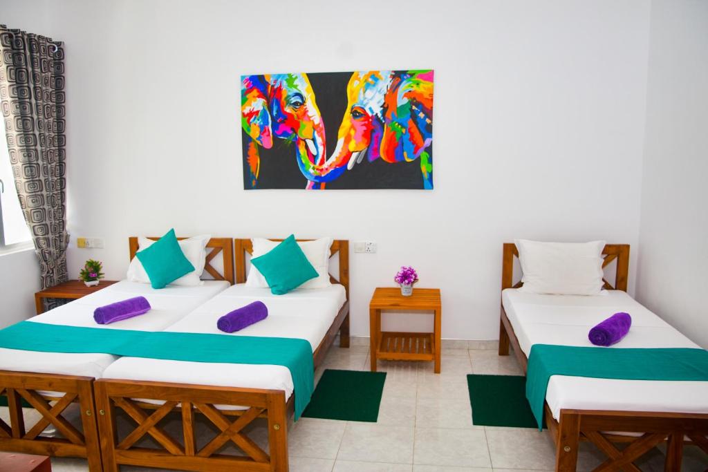 Postel nebo postele na pokoji v ubytování Di Sicuro Tourist Inn