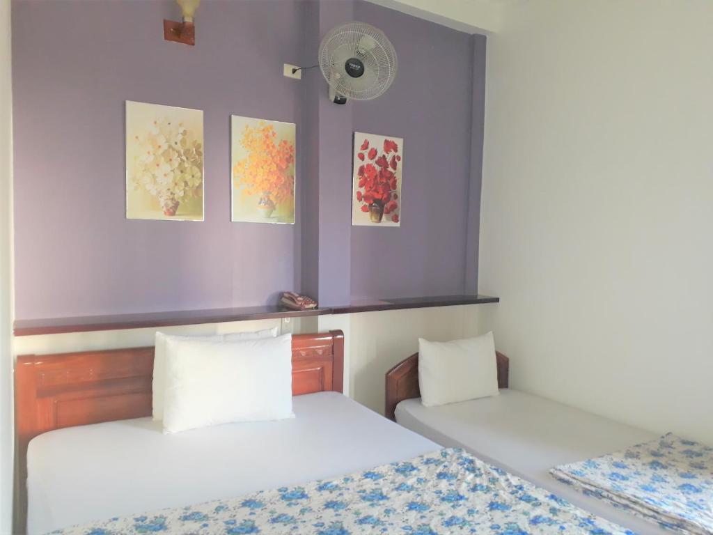 Postel nebo postele na pokoji v ubytování Blue Sea Hotel 2