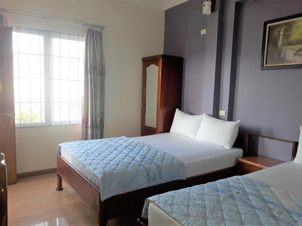 Uma cama ou camas num quarto em Blue Sea Hotel 2
